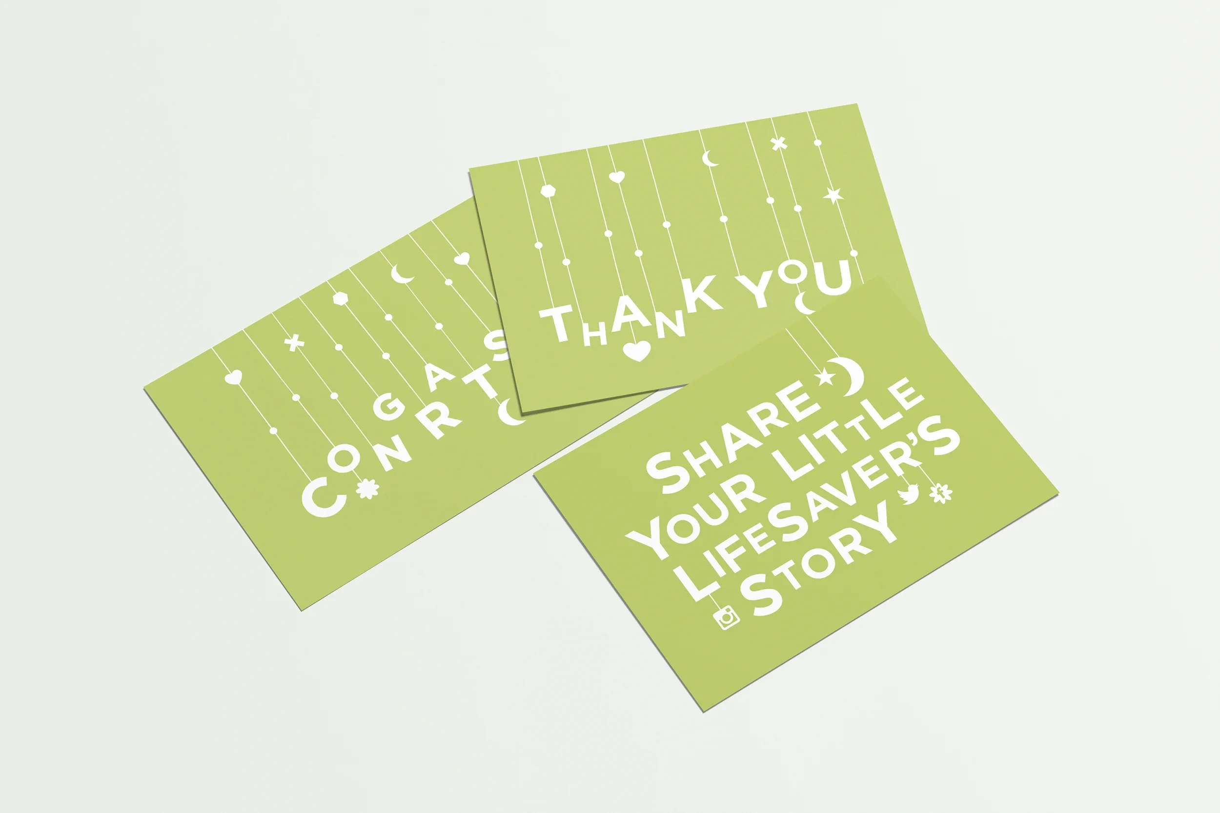 Green postcards reading "Congrats", "Thank you" and "Share your little lifesaver's story"