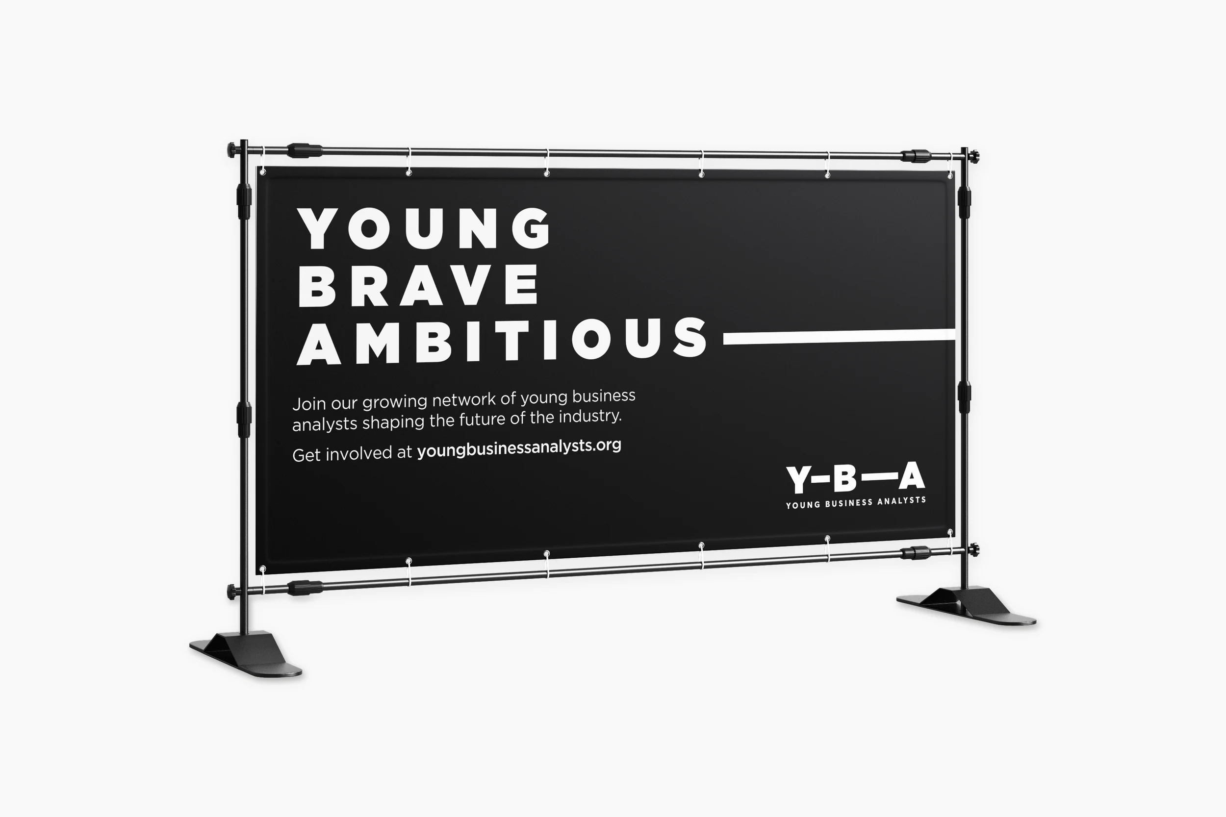 YBA conference banner on a frame stand, in black with &lsquo;Young, brave, ambitious&rsquo;, the extending line and the YBA logo